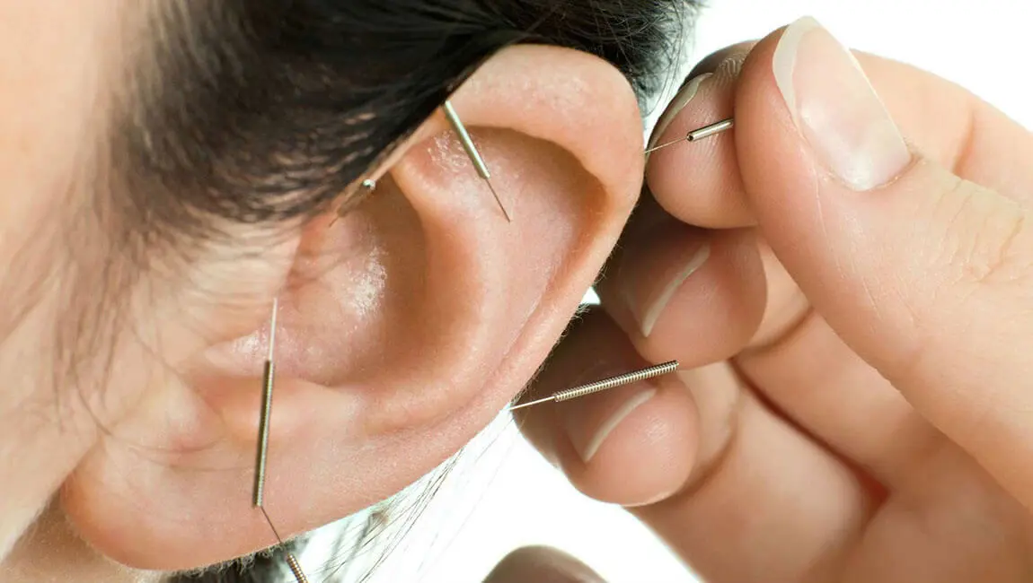 Massagem  com auriculoterapia